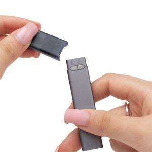 Juul 2 pod and device in hand UHtDUsaa